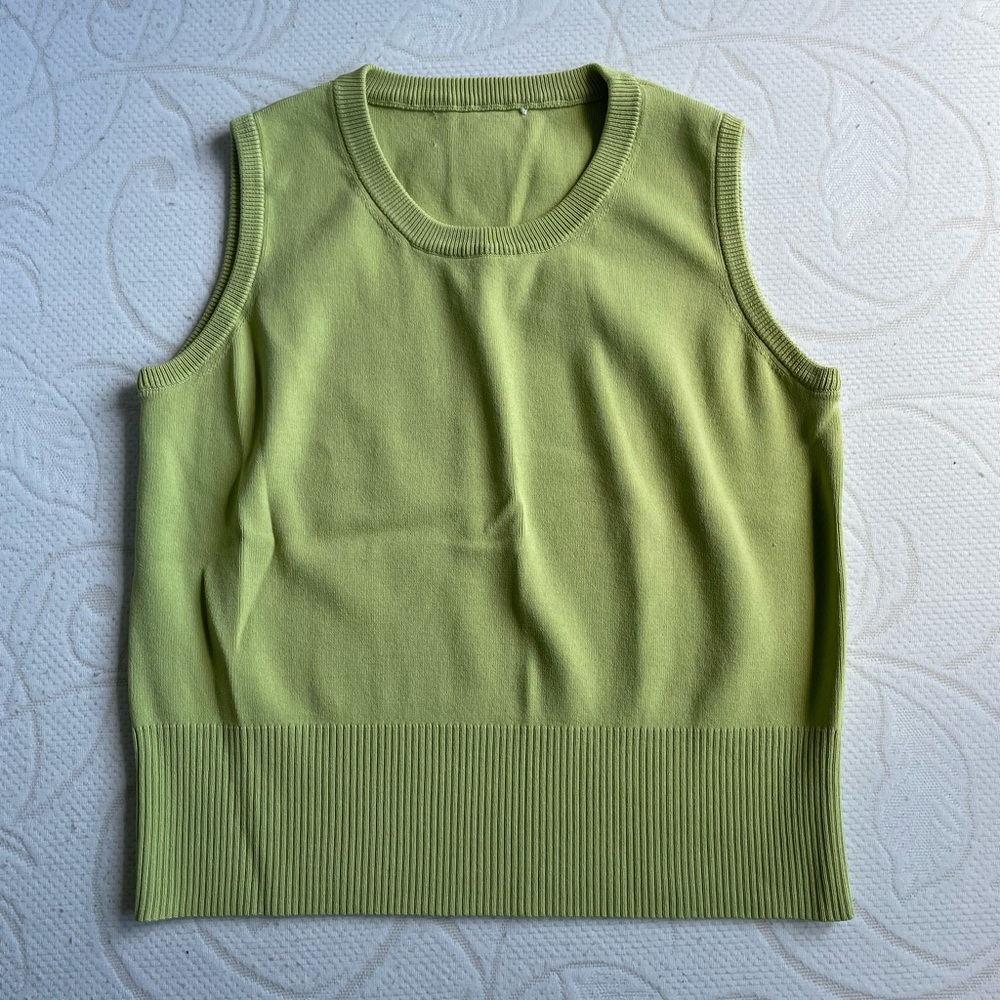 green sweater vest size medium